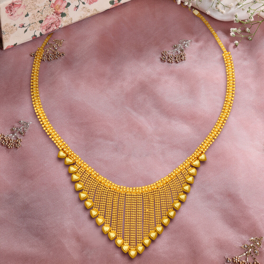 Tanishq gold necklace set sales
