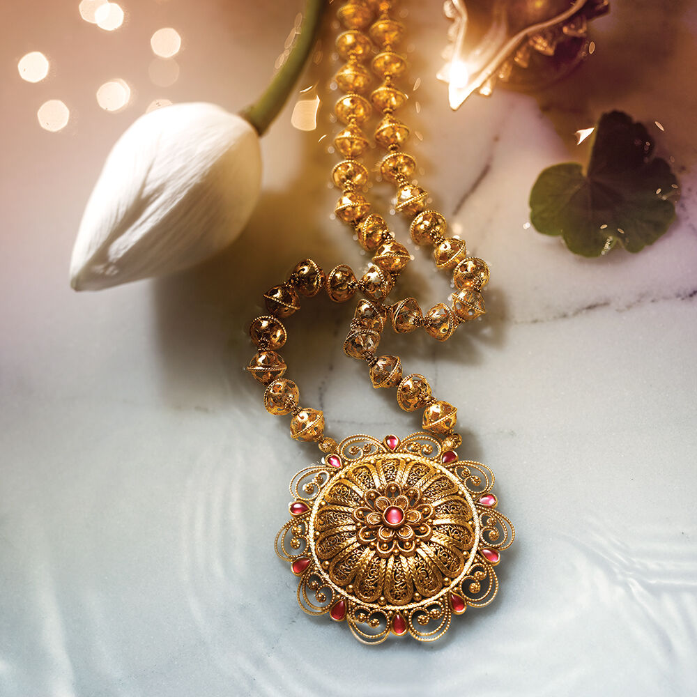 Tanishq gold pendant deals set