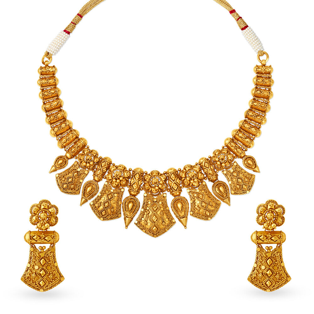 Gold set tanishq deals