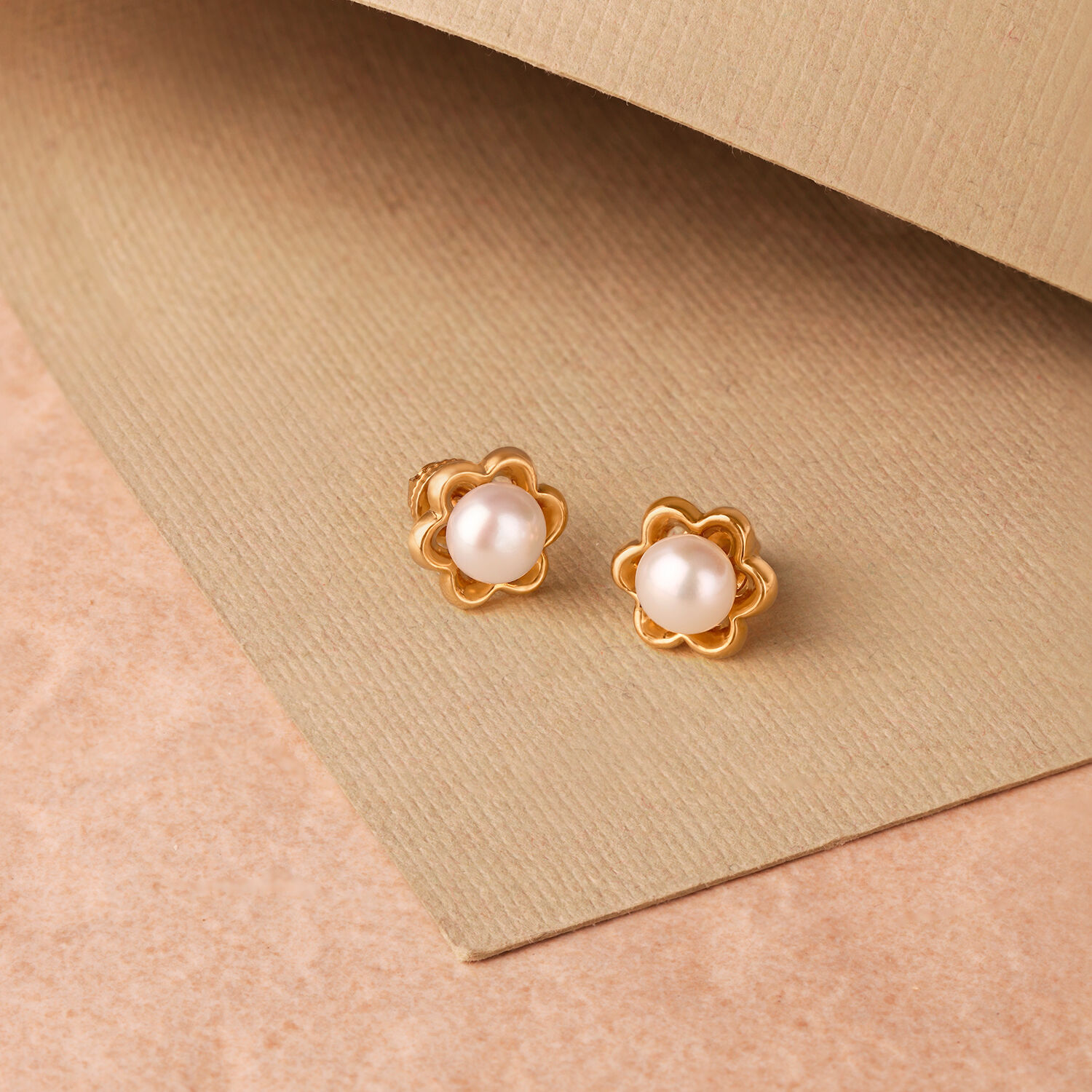 Pearl ear studs gold deals