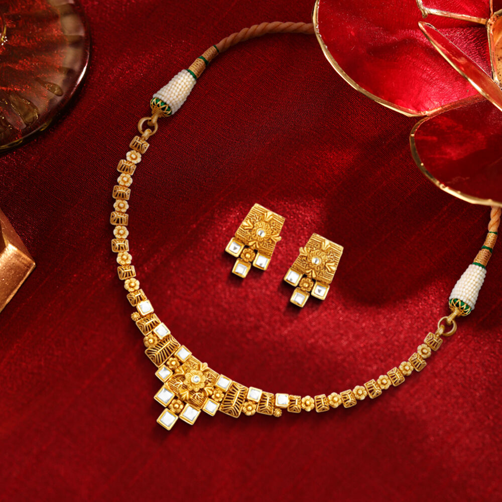 Tanishq on sale gold set