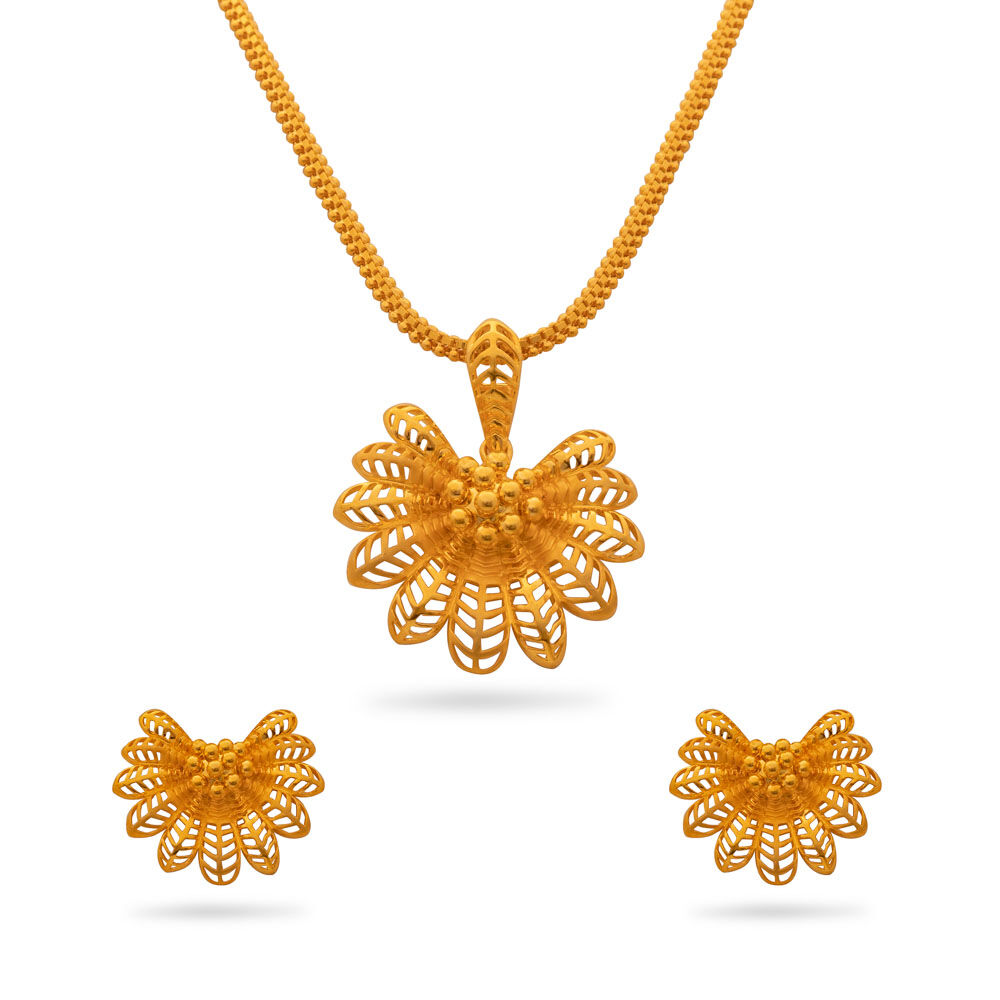 Gold pendant shop with earrings