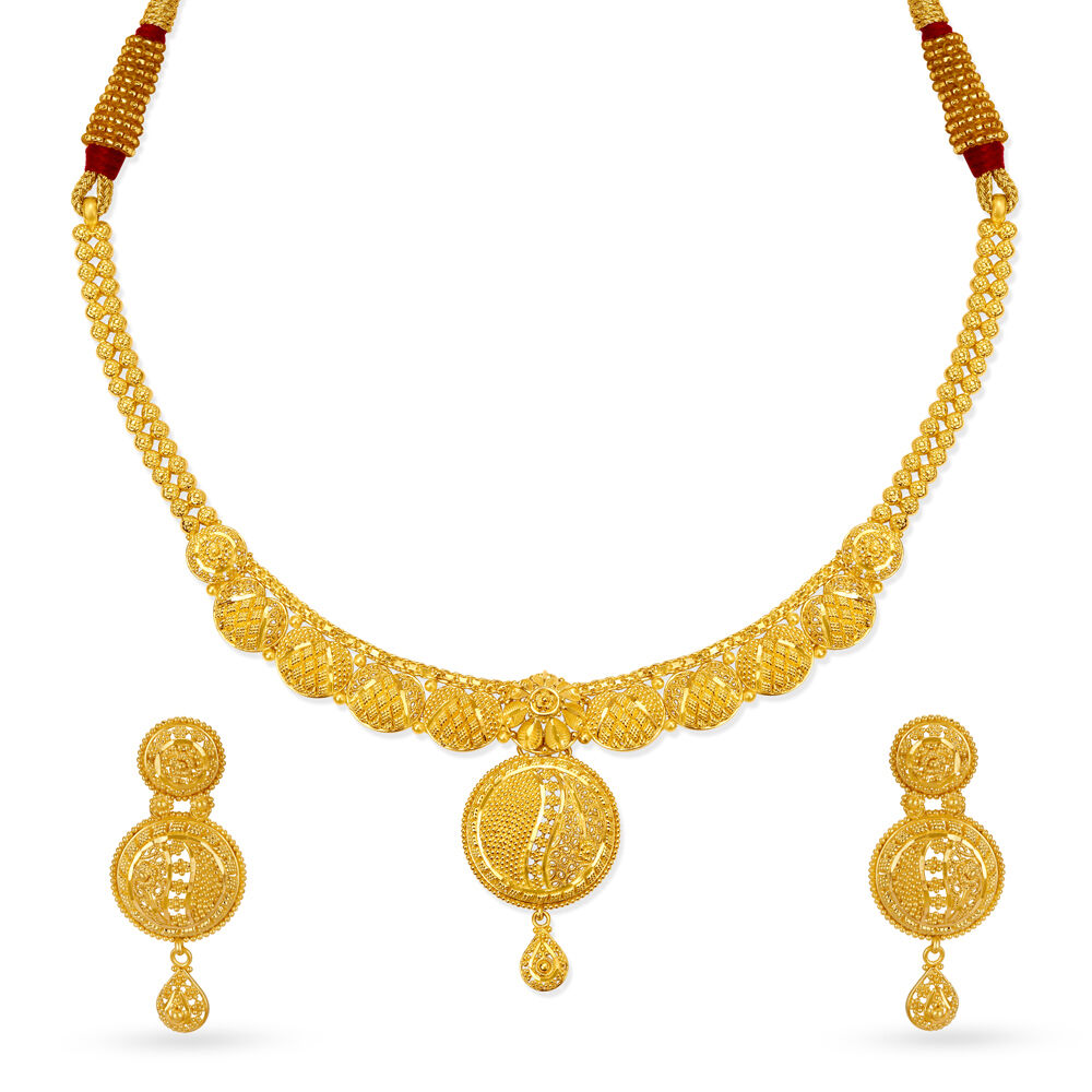 Gold necklace shop and earring set