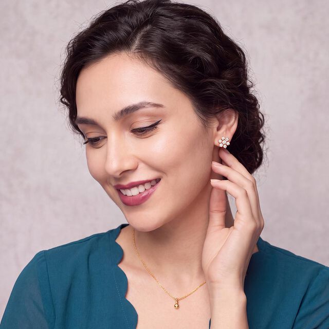Dainty Diamond Adorned Gold Floral Stud Earrings 3