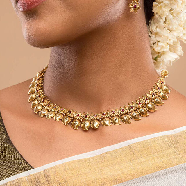 Elegant Pookkalam Gold Drop Earrings and MANGO UNIT 