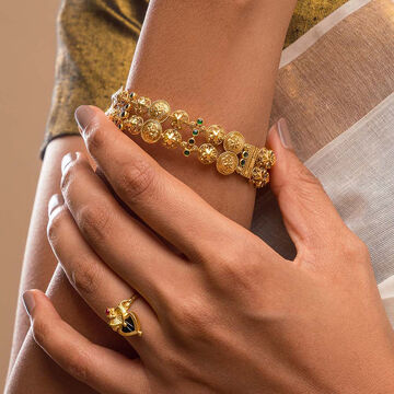Charm of Pookkalams Gold Bangle