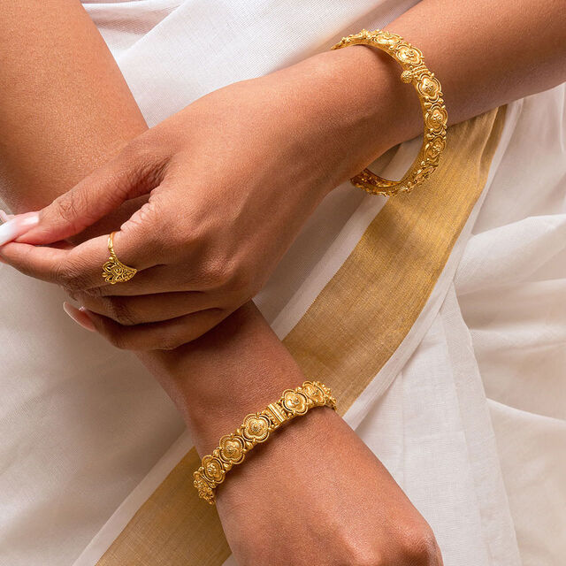 Adorable Pookkalam Inspired Gold Bangle 