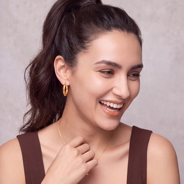 Tanishq Golden Cushion Curve Hoop Earrings for Women 2