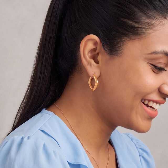 Tanishq Golden Cushion Curve Hoop Earrings for Women 