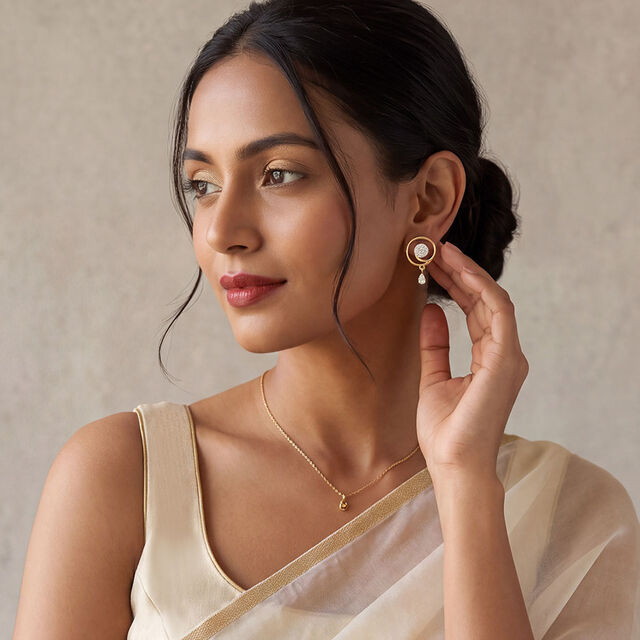 Tanishq 18 KT Swirl Drop Studs for Women 3