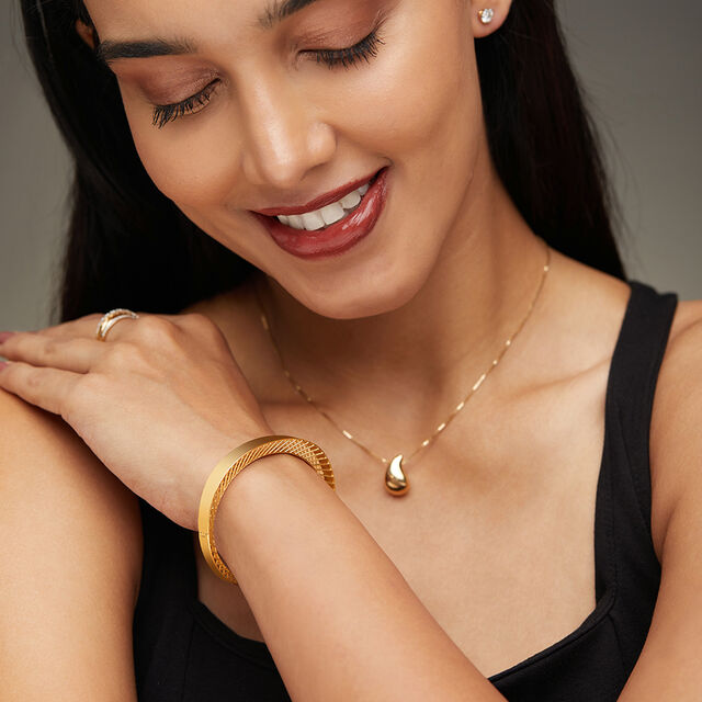 Tanishq 18KT Gold Bangle for Women 2