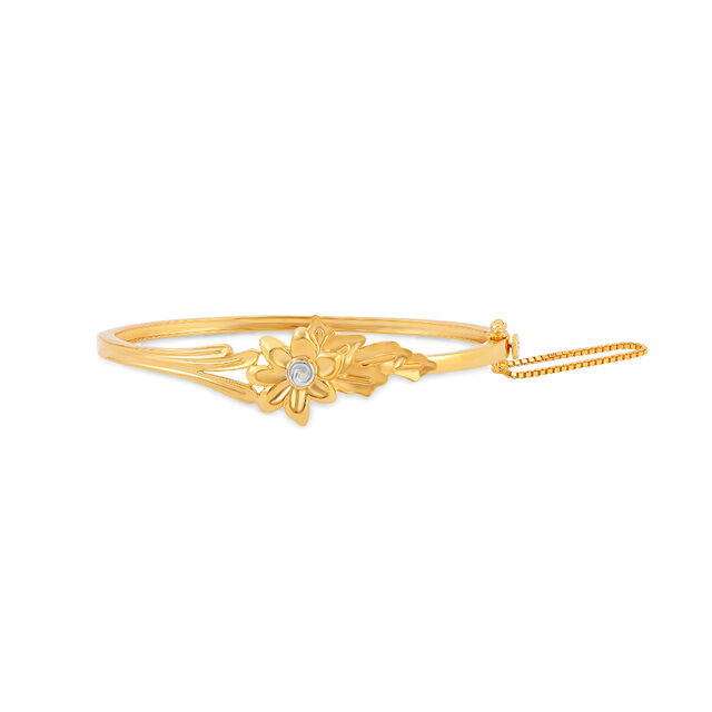Gold Bangle with a Gemstone Accent