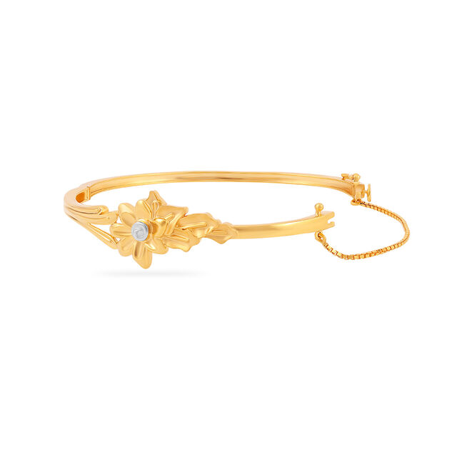 Gold Bangle with a Gemstone Accent