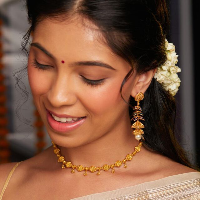 Vishu Glow Peacock Jhumka 