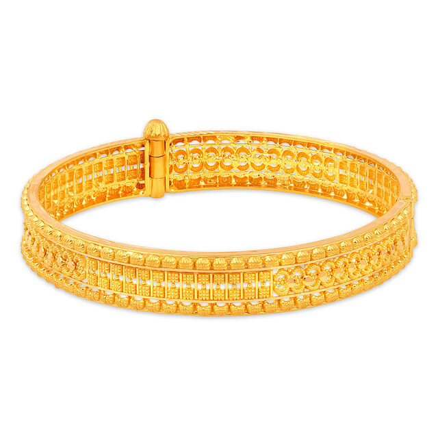 Orbiting Circles Gold Bangle 